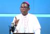 Why is an Ivorian diocesan bishop now an auxiliary?