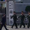 China acts against Japanese companies over military ties