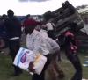SHAME! Kenyans captured on camera looting from an overturned truck on a major highway (VIDEO)
