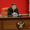 North Korean leader Kim Jong Un addresses the Workers' Party congress in photos released by state media on Tuesday.