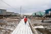 After remnants of typhoon wrecked their home, Alaska villagers consider possible move