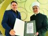 Grand Mufti of Bosnia and Herzegovina presents award to QF alumnus