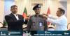 Bangladesh PM adorns new IGP Ali Hossain with rank badge