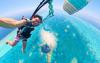 Skydivers Take the Ultimate Plunge Into Belize’s Great Blue Hole