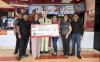 KFC Guam raises $5,000 in support of Harvest House foster care programs