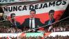 Fans of River Plate display a flag in honour of head coach Marcelo Gallardo during the Argentine Professional Football League 2026 Apertura Tournament match between River Plate and Banfield at the Mas Monumental Stadium in Buenos Aires on February 26,…