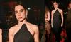 Dua Lipa is the epitome of chic in a sculpted black corset and skirt as she leads the stars at Warner Music's swanky BRITs afterparty following her surprise onstage performance