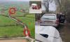 Floody idiots! Health and safety bosses ban flood-prone Dorset village from shutting gates every time it rains ... destroying cars in submerged water