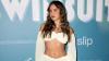 Bad Bunny’s girlfriend Gabriela Berlingeri poses in see-through skirt and sheer embellished top in Brazil