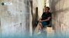 In a narrow alley in Honiara, Leah keeps going