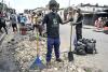 ‘Our streets aren’t bins’: Abidjan youth fight flooding and filth with a war on trash, one drain at a time