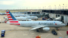 American Airlines Flight Swarmed By Fire Trucks On Landing At Chicago O’Hare Airport