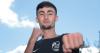 Louis Rooney gets action under away as five Team NI boxers stand one win away from medal