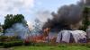 Angry crowd sets Ebola hospital tents on fire in DR Congo