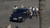 Bizarre moment hapless holidaymaker drives rental car straight onto busy Tenerife beach – leaving sunbathers bemused