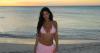 Kylie Jenner Shows Off Her Curves in a Bubblegum Bikini on Brand Vacation