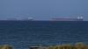 British military says ship is ablaze in Strait of Hormuz near coast of Oman