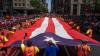 Puerto Rican Day Parade marches through Manhattan with pulsing music, vibrant colors