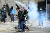 Bolivian police clash with protesters demanding president’s resignation
