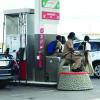 RISKING DISASTER - Students, commuters turn gas stations into gathering spots, taxi hubs despite dangers