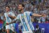 Lionel Messi’s history-making hat trick carries Argentina past Algeria