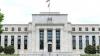 Bond markets, Wall Street settle down after Fed hike
