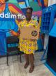 Osleena Cottam receives a Chromebook from Flow Antigua and Barbuda