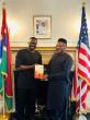 Gambian author presents memoir to Ambassador Bah