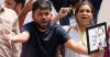 India's Cockroach Party supporters bang plates to call for education minister's resignation