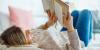 Learning to read may shape how adults reason about what others believe