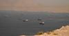 Oil slides to four-month low as Hormuz shipping recovers