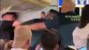 Moment Ryanair plane chaos erupts as ‘drunk’ passenger brawls with cops after ‘lover’s tiff’ sparked row on UK flight