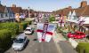 England flags fly on 'country's most patriotic street' after council told residents not to fly them for 'health and safety reasons'