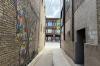 Downtown Alliance Taps Local Artist To Paint Central Minnesota History On St. Cloud Wall
