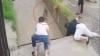 Dramatic moment boy, 12, is saved from drowning in fast-flowing drain after being swept away while trying to get ball
