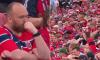 The ONE Norwegian fan refusing to join in with team's viral World Cup celebration! Hilarious moment single supporter sits still as thousands do 'The Viking'