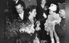 From the archives: Jane Russell greets an orphan in Tokyo, 1957