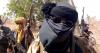WATCH: Nigerians react as viral video shows alleged armed bandits moving past police officers