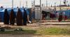 Australian woman and daughter to return from Syrian camp for IS families under strict conditions