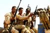 Paramilitary forces close in on key Sudanese city