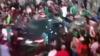 Terrifying moment car ploughs into crowd of fans celebrating Mexico’s World Cup win leaving at least 17 injured