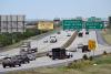 Falling gas prices fueling July Fourth travelers