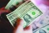 Oil slide softens dollar's inflationary bite