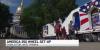 Workers set up America 250 Wheel at West Virginia Capitol
