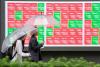 Stocks slide on renewed tech slump, oil prices fall