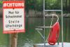 German lake at centre of language row opts for multilingual signs