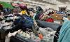 Oregon recycler fights fast fashion by turning stained tees, ripped Carhartts, and rags into cash