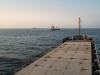 U.S.-Iran truce tested by attacks on Bahrain, hit on tanker in Strait of Hormuz