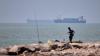 UK maritime agency raises Strait of Hormuz threat level after oil tanker reports being struck