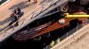 At least 6 people injured after Boston duck boat overturns near entrance to popular tourist attraction